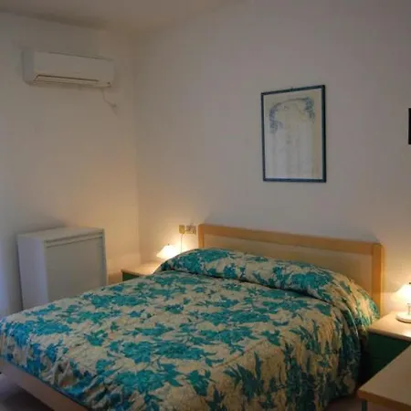Apartamento Villaggio Ginepri